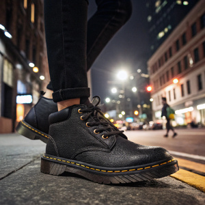 High-quality image of Dr. Martens Phoebe Women's shoes. Black color, detailed texture. Worn on a busy city street at night