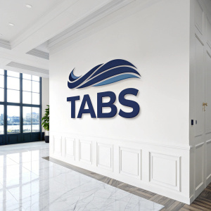 Minimalist logo design featuring the bold, sleek wordmark 'Tabs'. The letters are flanked by a sleek, abstract icon in a deep navy. Set against a crisp white backdrop.