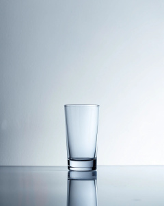 minimalist 1 glass on a white background