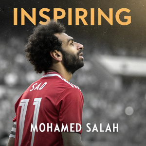 Mohamed Salah, soccer star, in a promotional poster. Wearing his jersey, number 11, with the caption 'INSPIRING' above him. Crowd blurred in the background
