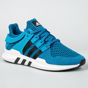 Modern, sleek Adidas EQT Racing ADV Primeknit shoes. Mesh-like texture and vibrant blue color, contrasting white sole. Black branding accents. Plain, neutral background showcasing the shoe's design.
