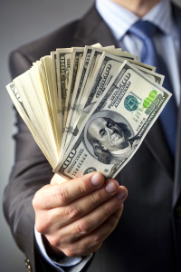 a wad of money in your hand