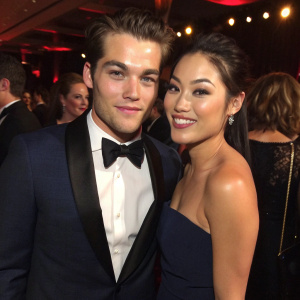 Dylan Sprayberry and Arden Cho, dressed in formal wear, at the 2015 MTV Movie Awards after-party.