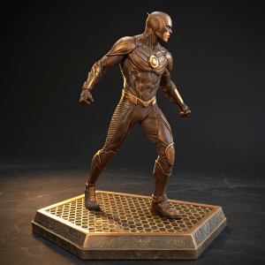 A dynamic bronze statue of The Flash from DC Comics. He stands in an action pose, showcasing his muscular physique and detailed costume. The sculpture is displayed on a honeycomb-patterned platform in a dark exhibition space.