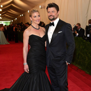 Katee Sackhoff and Karl Urban attending the Met Gala. Both are dressed in elegant evening wear.