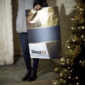 Creative promotional mailer for DirectVTV. Festive design with gold and black hues. Eye-catching imagery and text blend. Highlights 4K technology and DirectVTV branding.