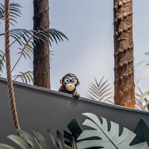 Bonzi Buddy, a playful monkey with glasses, exploring a colorful jungle setting.