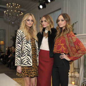Editorial photo shoot featuring Nicole Richie's Winter Kate collection. Models showcasing a variety of outfits including bold patterned jackets and solid color skirts and tops. Fashion week event.