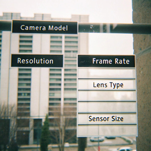 Structured Excel sheet detailing camera setups and specifications. Columns labeled 'Camera Model', 'Resolution', 'Frame Rate', 'Lens Type', 'Sensor Size'. Each row contains detailed information about a specific camera setup.