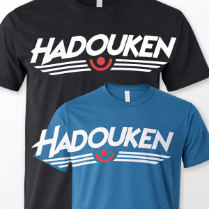 Digital art featuring two street fighter themed t-shirts. The designs are simple, bold 'HADOUKEN' text in white on a black and blue t-shirt. White plain background
