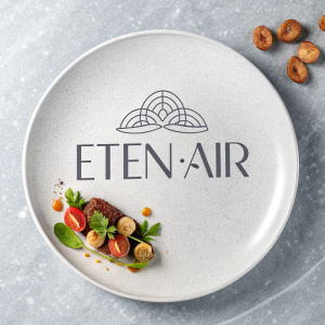 Elegant logo design for Eten/Air, showcasing the brand name in sleek, modern typography. Grey tones and minimalist aesthetic convey sophistication and premium dining experience.