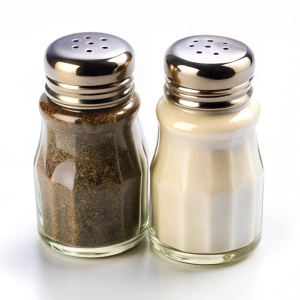 salt and pepper shakers on white background