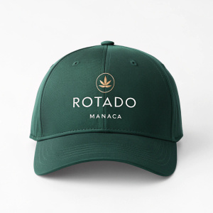 Minimalist branding design for Rotado Manacá. Main color is dark green. The logo and tagline in modern, clean font. Background is plain white. Emphasizes simplicity and elegance.