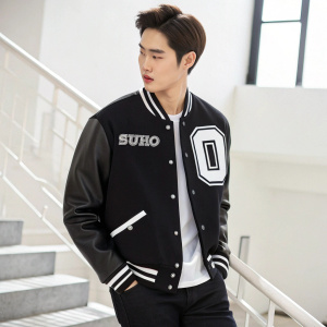 SUHO from EXO in a black varsity jacket with white accents. The jacket features a prominent number and name tag. Simple white background, high-resolution photo