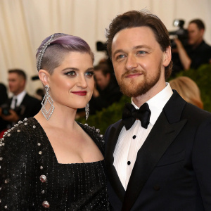 James McAvoy and Kelly Osbourne at the Met Gala. Kelly in a black sequined dress and diamond earrings.