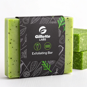 Gillette Labs Exfoliating Bar in a modern package design. Black and green color scheme. Product description and benefits highlighted with icons.