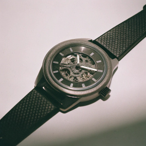 Modern watch showcase: Bulova Accutron Curacao Automatic. Features sleek design and black nylon band.