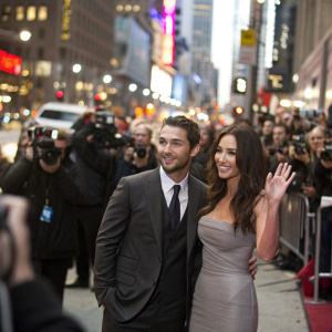 Shia LaBeouf and Megan Fox on the bustling New York City street, posing for paparazzi.