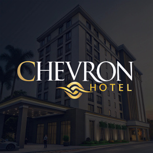 Chevron Hotel's vibrant logo in modern font, centered against a dark background with hints of gold. The brand name stands out prominently.