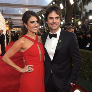 Ian Somerhalder and Nikki Reed at the Golden Globe Awards. Formal attire, red carpet scene.