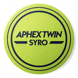 Aphex Twin's SYRO logo. The design features a vibrant lime green circular shape with stylized text 'aphextwin syro' in a contemporary font.