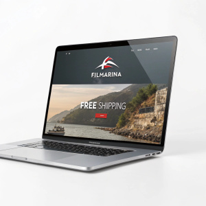 MacBook Pro displaying an elegant webpage for Filmarina. The site features the Filmarina logo prominently, along with a bold advertisement for free shipping. The design is sleek with a mix of text and graphics on a predominantly gray background.