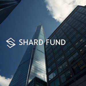Shard Fund logo featuring a sleek, angular geometric shape. Dark background highlights the logo's solidity and strength. Modern sans-serif font adds a contemporary feel.