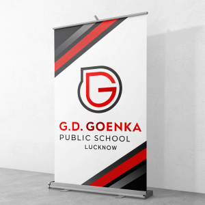 Modern digital artwork showcasing the logo of G.D. Goenka Public School Lucknow. The design features a sleek G-shaped emblem with bold red text. The color palette is predominantly red, black, and gray against a clean white background.