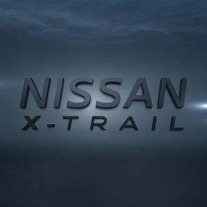 Nissan X-Trail logo, sleek design, modern sans-serif font in dark grey, positioned centrally on a bright white backdrop.