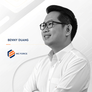 Benny Duang, the visionary CEO of McForce, with a sleek bio beside him. He is in a crisp white shirt and black frame glasses. Professional headshot with a simple, modern background.