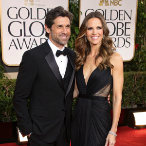Patrick Dempsey and Hilary Swank at the Golden Globe Awards. Both dressed in black formal attire.