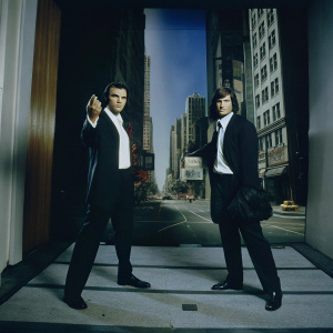Quentin Tarantino and his wax double posing at the Madame Tussauds attraction in Times Square, New York.