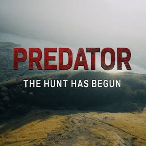 Promotional graphic for Predator. Large red grunge font 'PREDATOR'. Subtitle 'THE HUNT HAS BEGUN' in white. Dark, textured background. Aggressive design.