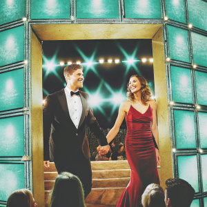 Robert and Anna Lewandowski at a glamorous awards ceremony. Holding hands and smiling warmly
