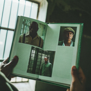 A detailed article on 'The Shawshank Redemption: Behind the Scenes'. Exploring the intricate makeup and costumes that brought the characters to life. Beautiful imagery showcasing the meticulous work.