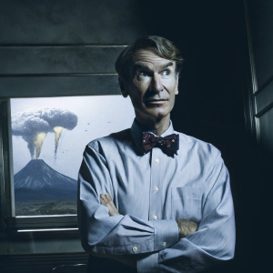Bill Nye, known as the Science Guy, is featured on the DVD cover for 'Volcanoes'. Wearing a blue shirt and bow-tie, he stands in front of a digital backdrop of exploding volcanoes and floating parachutes. Disney logo prominently displayed.