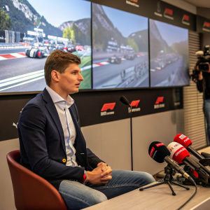 Max Verstappen during a press conference at the Monaco Grand Prix. Smart casual outfit.