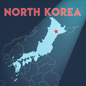 Digital map illustration focusing on North Korea. Red bold text reads 'NORTH KOREA'. Dark background with a light blue spotlight effect on the highlighted region.
