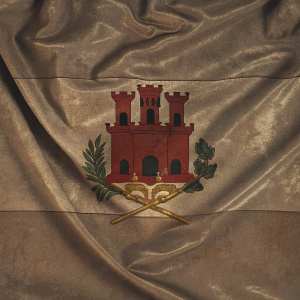 Gibraltar's coat of arms featuring red castle, San Marino flag, crown and emblem displayed on a formal backdrop.