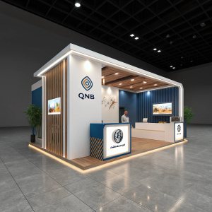3D rendering of QNB Bank booth featuring sleek, contemporary design. The booth combines white and blue panels with subtle wooden accents. QNB logo prominently displayed. Lighting design is warm and inviting, creating a professional atmosphere.