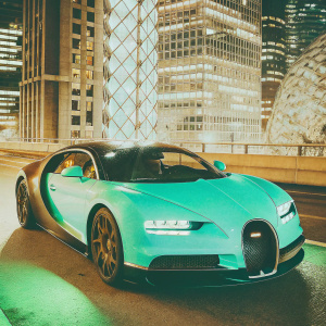 Render of Bugatti Chiron, glowing in the night with neon lights. Futuristic cityscape, sleek and modern design