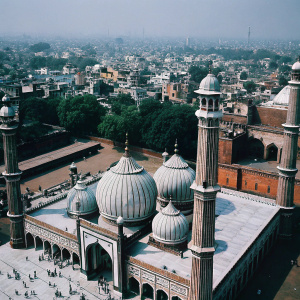 Aerial view of the grand Jama Masjid Mosque. Located in bustling Old Delhi, India. Richly decorated with towering domes and minarets.