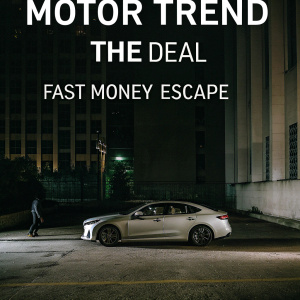 Promotional ad for Motor Trend's 'The Deal'. Infiniti Q50 car parked on a dark, menacing street corner at night. A lone figure stands near the vehicle. Bold text highlights themes of fast money and escape. Urban cityscape background.