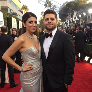 Jamie-Lynn Sigler and Jerry Ferrara at the Golden Globe Awards. Jamie-Lynn in a stunning silver gown, Jerry in a tuxedo. Crowded red carpet
