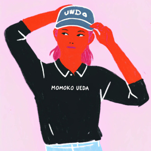 Momoko Ueda, Asian model with fair skin, strikes a confident pose. Wearing a black long-sleeved polo shirt with white lettering and a casual baseball cap featuring bold red logo. Close-up shot against plain white background.