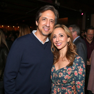 Ray Romano and Anna Scarpulla Romano attending the 'Everybody Loves Raymond' DVD launch party. Ray, donning a navy sweater, Anna in a floral dress. Crowded room, dim lighting