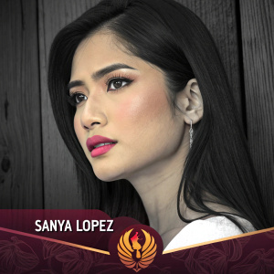 Sanya Lopez, Asian woman, intense look, long black hair, minimal makeup, pink lipstick. Event logo at bottom, dark wood background, close-up shot.