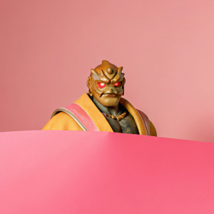 Ganondorf from The Legend of Zelda, glowing red eyes, intimidating face, alien-like crown. Dark background