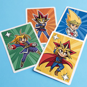 A collection of Yu-Gi-Oh! themed sticker sheets. Characters in action poses. Brightly colored stickers on a clear blue backdrop.