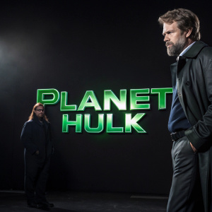 Promotional photoshoot for Marvel's Planet Hulk. Dark background, green title 'Planet Hulk'